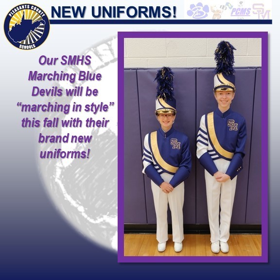 picture of two students wearing the new band uniforms.
